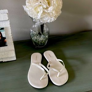 Almost new white flip flops